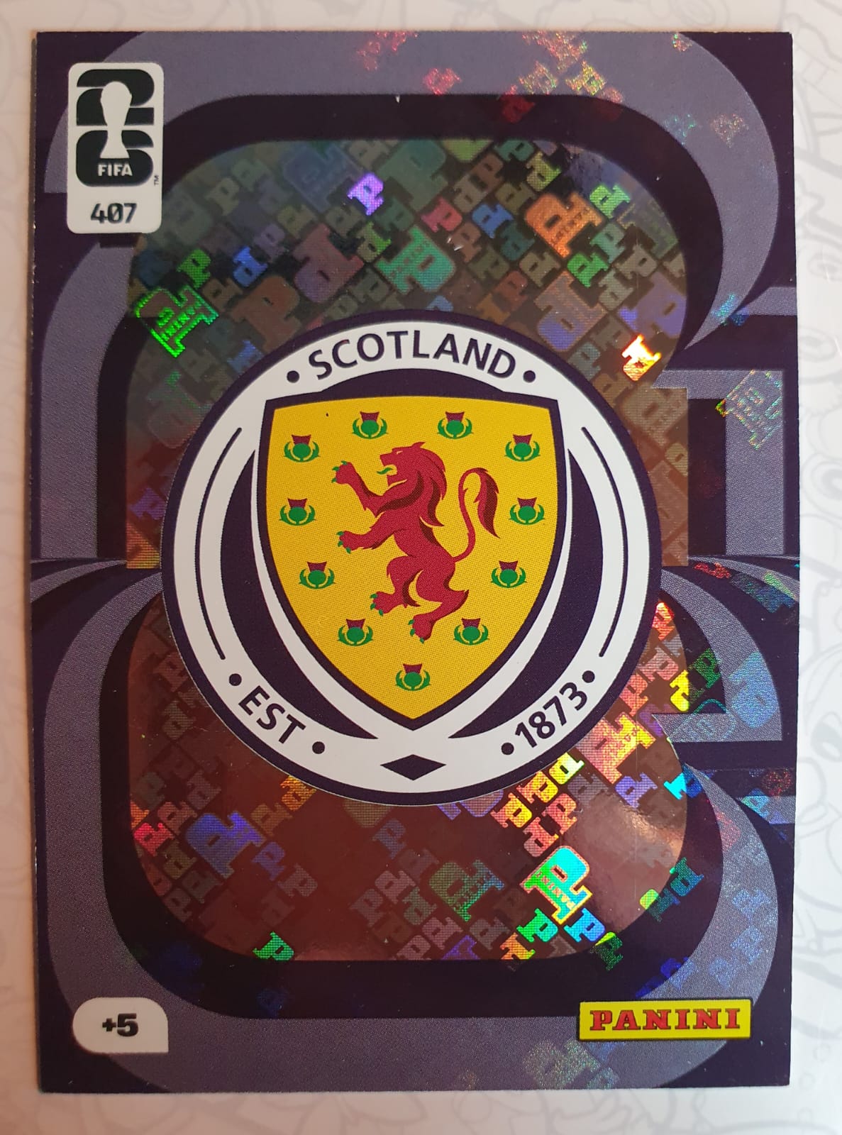 Scotland Badge #407 - Panini Adrenalyn XL FIFA World Cup 2026 - Frente